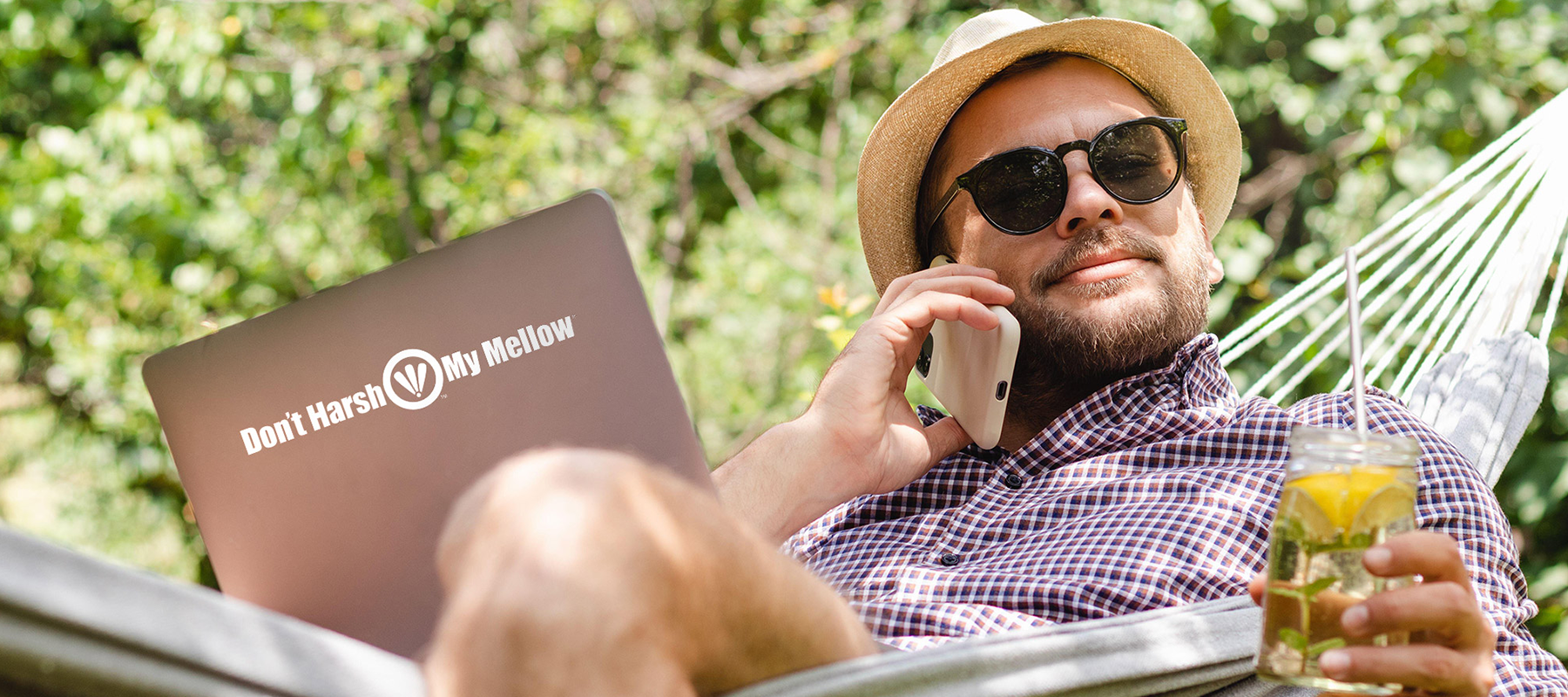 guy-on-hammock-with-laptop-sticker-dont-harsh-my-mellow